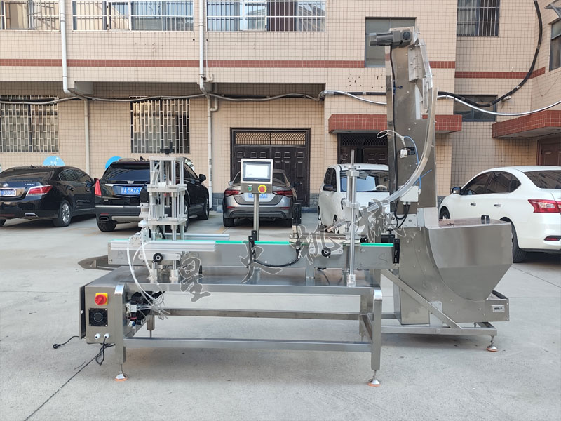 江蘇星火自動壓蓋封口機(jī)