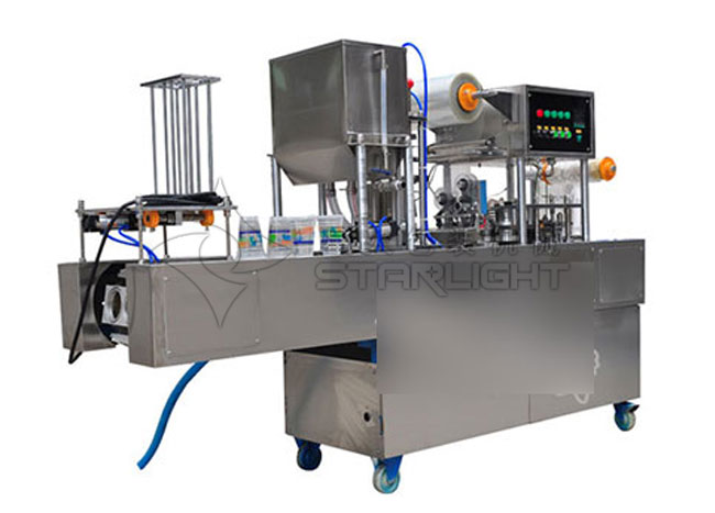 星火盒裝米酒食品全自動封口機設(shè)備展示